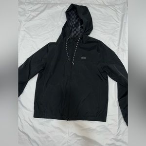 Black Vans rain proof windbreaker. Barely worn and in perfect condition.